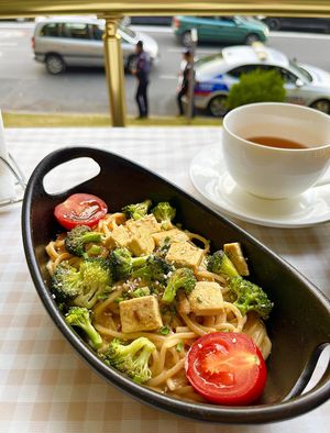 Thai peanut butter noodles: spaghetti noodles with broccoli and tofu with spicy peanut sauce and green onion at Future Diner in Yerevan