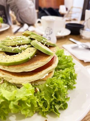 Vegan pancakes with salty topping: avocado, tomatoes, vegan mayo, salad. Not on the menu, cooked at my request. at Future Diner in Yerevan
