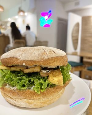 Vegan Crispy burger with fried tofu and extra added grilled mushrooms at Future Diner in Yerevan
