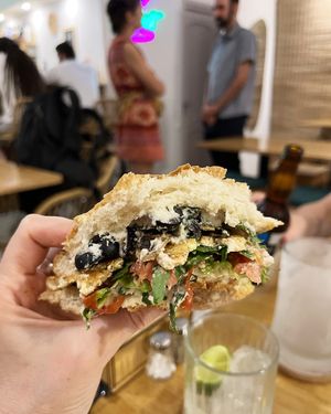 What's inside? Vegan Crispy burger with fried tofu and extra added grilled mushrooms at Future Diner in Yerevan