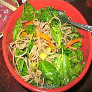 Cold Soba Salad with marinated soba noodles in a cilantro vinaigrette tossed with carrots, spinach and edamame. Topped with sesame seeds and cilantro. at Sticky Rice in Baltimore