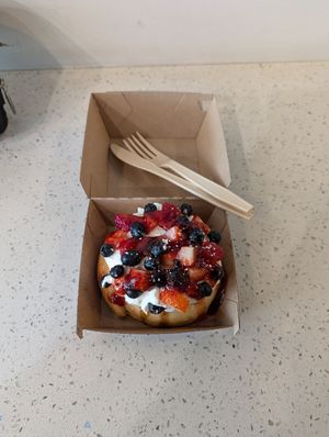 Delicious Very Berry cinnamon roll. Tasted like a funnel cake! at Cinnaholic in Calgary