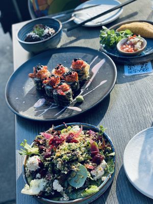 Caesar salad, crunch roll, empanada, pesto croquette  at Nightshade in Vancouver