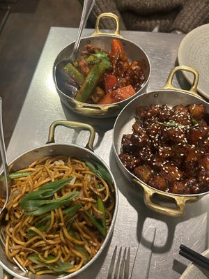 Top to bottom: Chilli (mock) chicken, soy vegetables, and Hakka noodles   at Fatt Pundit - Soho in London
