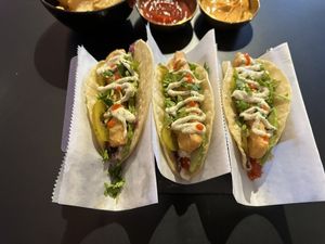 east west spicy tacos ($13) - 2/10 for me because i couldn't stand the sauce, my partner liked them though   at Voodu Vegan Bistro in Tampa