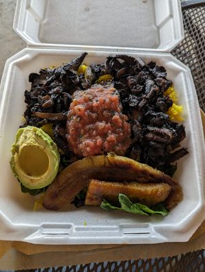 Mushrooms over rice at Chef Will The Palate in Huntsville