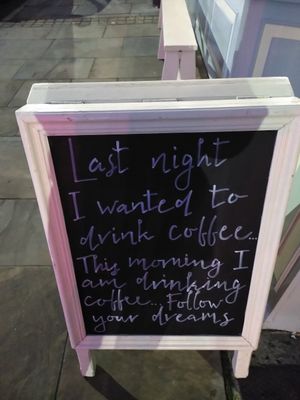 The café's amusing board ☕ (Jan 2022) at Leoni in Malton