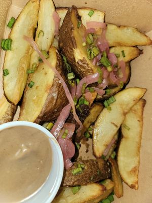 Herbed potato wedges and garlic aioli at Fellow Traveler in Englewood