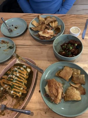 Deep South Broadway burrito, el barracho in green Chile and other with BBQ, Chile like cauli - amazingly delicious!!  at Fellow Traveler in Englewood