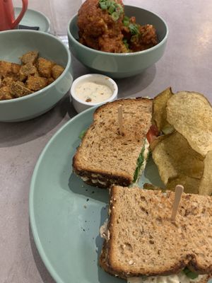 Chickpea sandwich, house fries, Chile garlic wings and ranch!  Delicious!! 😋  at Fellow Traveler in Englewood