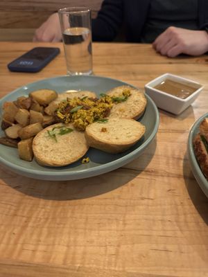 Biscuits and onion gravy on the side  at Fellow Traveler in Englewood