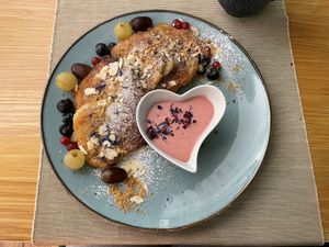 Racuchy (pancakes with strawberry coconut sauce )  at Las Vegan in Gdynia