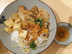 Spring roll + tofu vermicelli bowl: very nice sauce and freshness $15.00 at Easy Vegan in Richmond