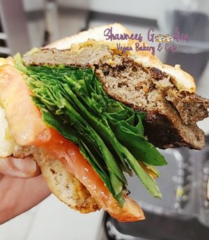 Tasty vegan burger made from scratch with mushrooms and tomatoes!! We make our buns from scratch as well💚 at Shawnee's Goodies Vegan Bakery & Cafe in Lilburn
