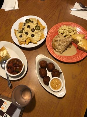 Nachos, chicken& gravy, Mac cheese, hush puppies & chili  at Cornbread Cafe in Eugene