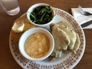 Chicken Tempeh, Cheesy Grits, Greens, and Cornbread at Cornbread Cafe in Eugene