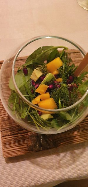 salad with herbs and mango at Lackner Stubn in Lagundo