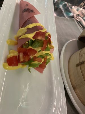 Temaki con riso,pomodorini, insalata e salsa zafferano  at Yang Asian in Bagnolo Mella