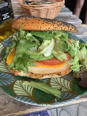 Bagel with lettuce, avocado, tomato and vegan cheese  at Pikis Labis in Sevilla