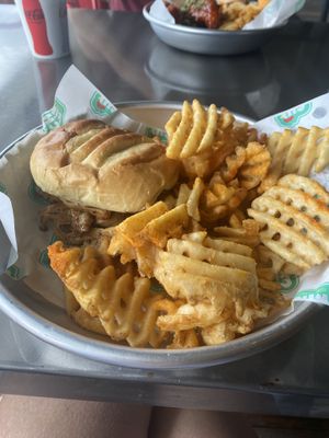 vegan chicken sandwich with fries  at Chi-Kin in Orlando