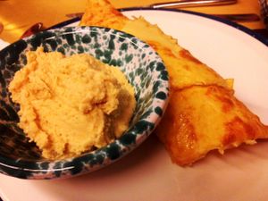 hummus with savory chickpea pancake socca at 5 e Cinque in Florence