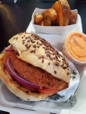 Crunchy burger with fries at Egg Plant in Tijuana