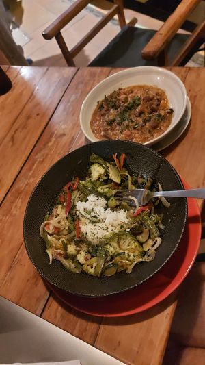 Vegetable wok dish, with a side of beans at Divanga Hostel in Taganga
