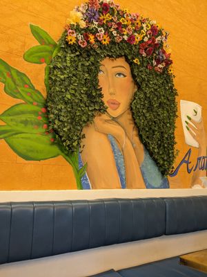Inside wall art at Aroma Espresso Bar in Miami