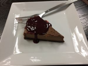 chocolate ";cheese"; cake with blackberry sauce.  at Baagan in Rocklin