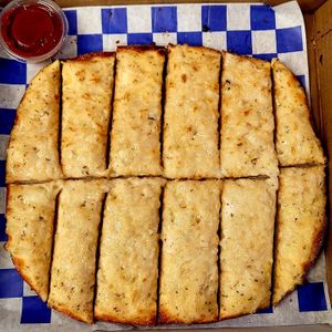 Vegan Cheesy Breadsticks!

These breadsticks have our signature vegan creamy garlic sauce, and our signature vegan cheese. at Pizza Twist in Fairfield