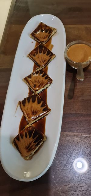 Tofu Coffee Coulis...delicious  spiced nibble at The Viridian Plate in Chennai