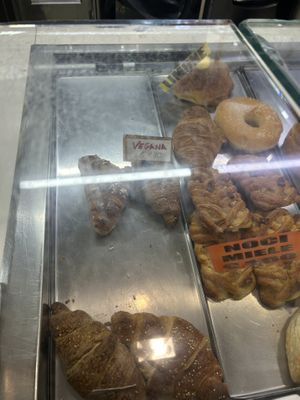 Vegan croissants. Today they had 2 flavours. Mine were oat with a strawberry filling and they also had orange. Very nice and friendly staff.  at Sweet Moment in Bologna