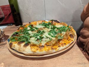 Vegan parmesan and ham pizza at Bella Vita in Strasbourg