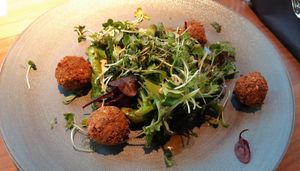 Roasted wild broccoli on hazelnut cream at ÜBERLAND in Braunschweig