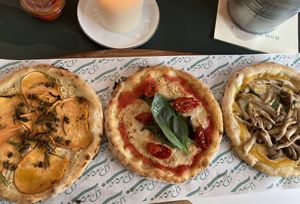 Trio of vegan pizzas on gluten-free crust  at Pico Pizza - Vesterbro in Copenhagen