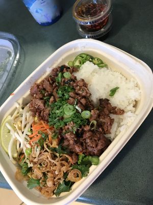 Crunchy chili basil beyond beef. Slaw is great! Love that it comes with chili oil 💜   at Plant Box in Austin