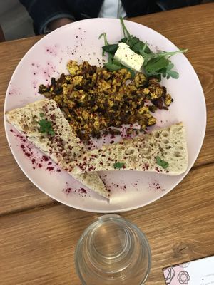 The tofu scramble with mushrooms and sun dories tomatoes and delicious sourdough toast .  at The Little Gem in Royal Wootton Bassett