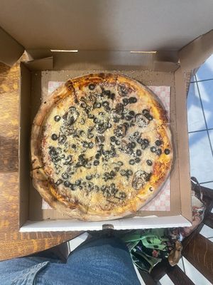 i added follow your heart parmesan cheese, the pizza will look slightly different without this added cheese   at Uncle Gino's Pizzeria in Temecula