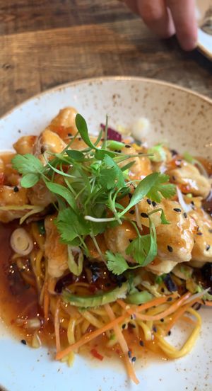 Tasty Crispy tofu or vegan chicken noodles 🍜  at Huggers in Norwich