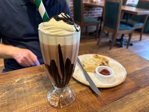 Chocolate milkshake with scone and jam at Huggers in Norwich