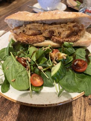 Sausage and hash brown baguette  at Huggers in Norwich