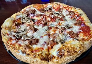 Vegan sausage, mushroom, onion. Excellent hand tossed crust!  at Milwaukee Street Pizza in Janesville