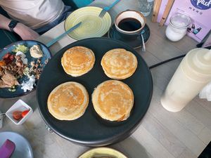 Pancake maker on the table at Impact Café  in Cologne