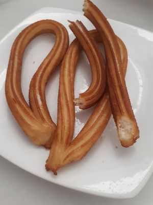 Churros.  You get 4 pieces in one portion at Orxateria Santa Catalina in Valencia