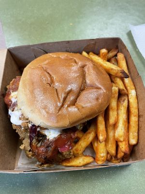 “Chicken” burger with side of fries   at Vegan Planet Café in Norfolk