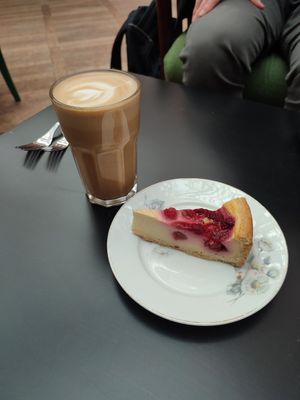 Oat latte and raspberry cheesecake at Kafe Hummusson - 2nd Floor in Malmo
