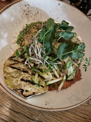 Celeriac steaks, barley risotto  at Vrijdag in Amsterdam