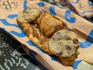 Ugly but tasty croissant filled with chocolate and cookies on the ends at Bakery Bakery - HB in Zurich