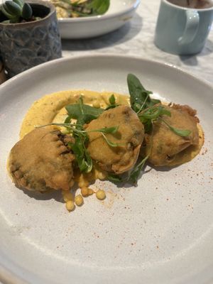 gunpowder bonda, pea spinach & potato fritters, mango pickle yoghurt  at Mildreds - Covent Garden in London