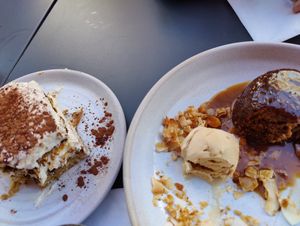 Tiramisu and banana cake missing a bite... 😅 at Mildreds - Covent Garden in London